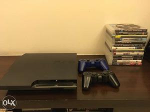 Sony ps3 with 2 controllers 14 games ps move