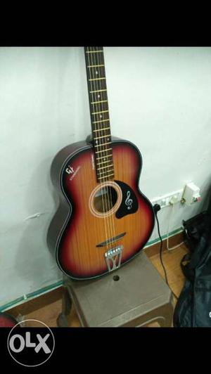 Sunburst colour hollow acoustic guitar, colour is