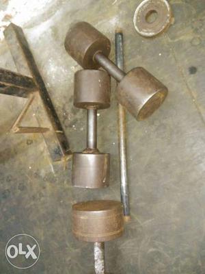 Two Brown Dumbbells