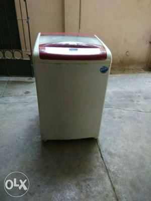 White And Red Top Load Washer