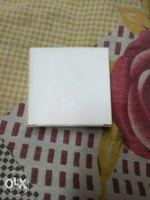 White Xiaomi redmi head phone