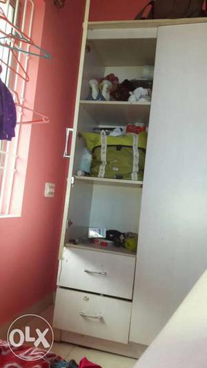 3 door wooden cupboard only selling for very leas