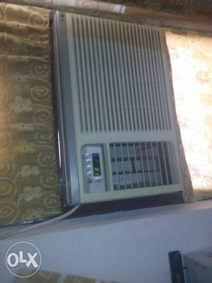 Beige And Gray LG Window Type Air Conditioner