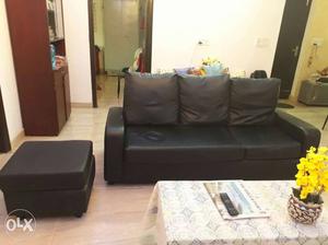 Black Leatherette 3 +1 Seat Sofa in good condition