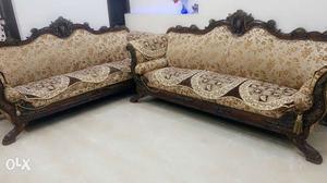 Brown Wooden Framed Brown Fabric Floral Padded Sofa