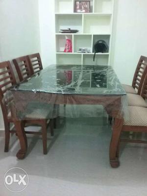 Dining table with chairs (6 nos) made from teak