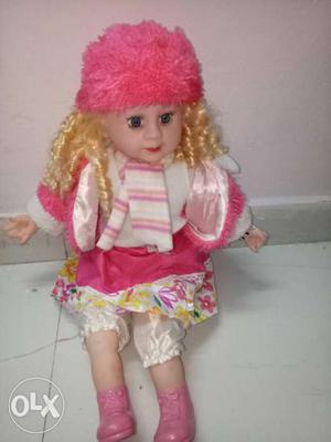 Doll Wearing Pink Dress