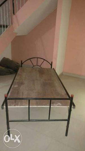 Foldable rot iron single bed.