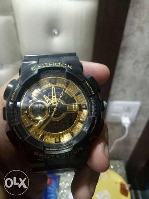 G-shock watch black n gold colour 100 percent fix price