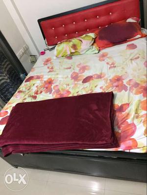 Iron double bed with matress 7*5 negotiable used