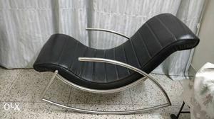 Irony rocking chair. New condition.