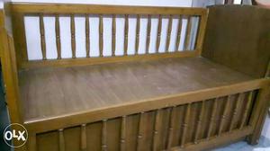 It's 5ft by 2.5ft hard wood Cot in good condition.