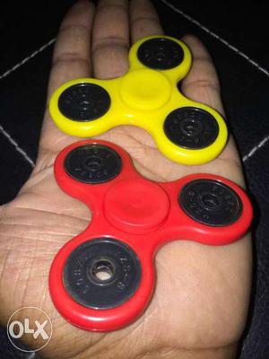 New Two Red And Yellow Three-bladed Fidget Spinners Many