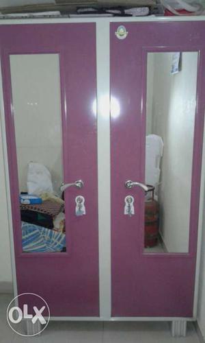 Pink And White Two Door cupboard With Mirror Closet