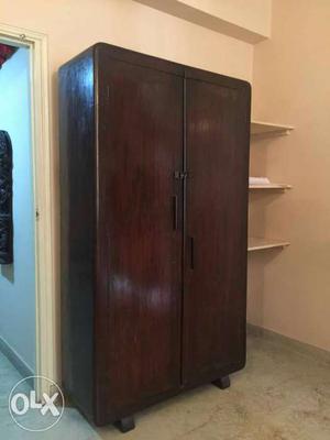 Pure teak antique wooden cupboard in very good condition.