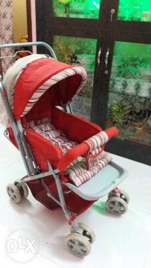 Red And White Stroller