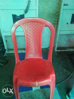 Red Plastic Armless Chair