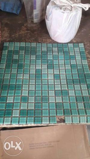 Reflection companys mosaic tiles in packed boxes