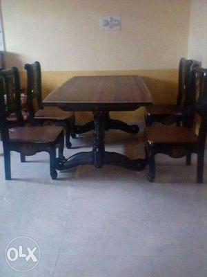 Rosewood dining table with 6 chairs