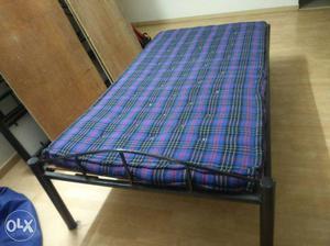 Single cot along with mattress for sale