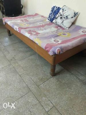 Single wooden cot for sale without mattress