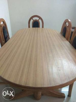 Solid wooden dining table with 6 chairs. 4 years