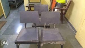 Three Black And Gray Wooden Chairs