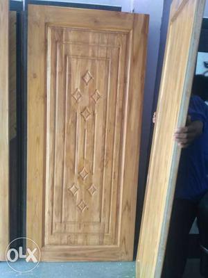 Two Brown Wooden Door Panels