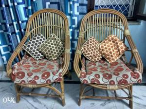 Two Brown Wooden Framed Chairs