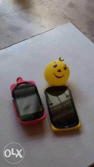 Two Red And Yellow Smartphones