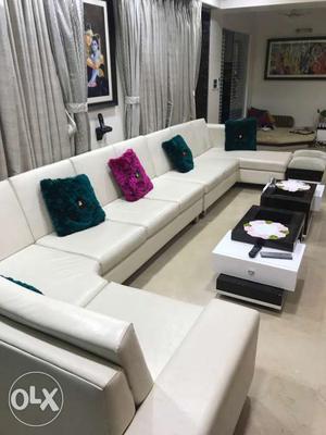 White Leather U-sectional Sofa for seating of  people