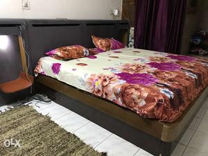 Wooden King size bed with under storage and side tables with
