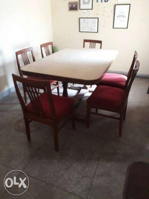 Wooden dinning table with 6 chairs for sale