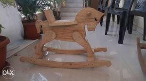 Wooden rocking horse.