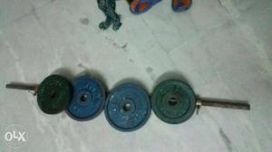 Four Gym Plates And Barbell Bar+ dumbbell