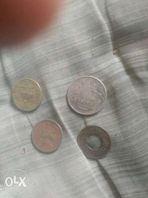 Four Pieces Of Round Nickel Coins