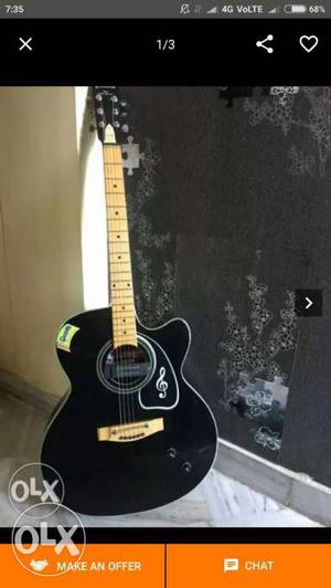 Givson guitar black, around 3 months, in a new