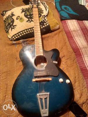 Givson's semi acoustic guitar navy blue color