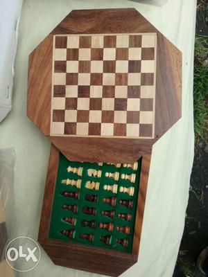 Round good quality wooden chessboard.
