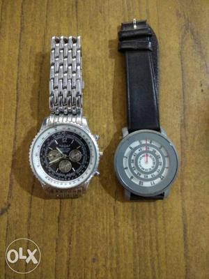 Two Silver Round Watches