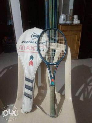 Blue And Gray Dunlop Tennis Racket With Case