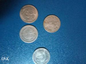 Four 25 India Rupee Coins