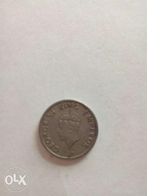 Man's Profile Round Silver Coin