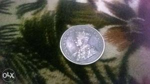 Olden time silver coin one rs.Interested buyer
