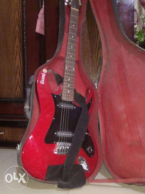 Red Givson Electric Guitar with hard box.