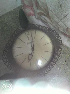 Round Brown Metal Clock