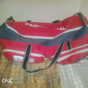 SS Professional Cricket wheel bag in red colour