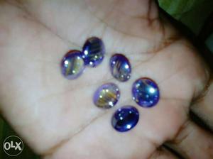 Six Blue Round Marbles