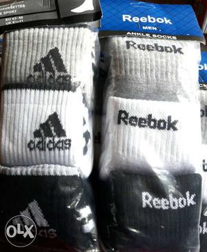 This is Adidas and Reebok socks in 100% New