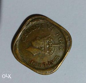 This is  coin George VI king empire